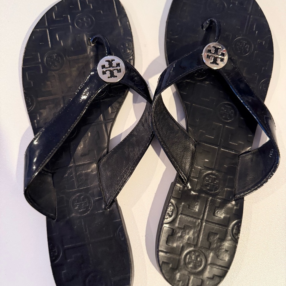 Tory Burch Black Flip Flops with Silver Logo - Picture 2 of 3